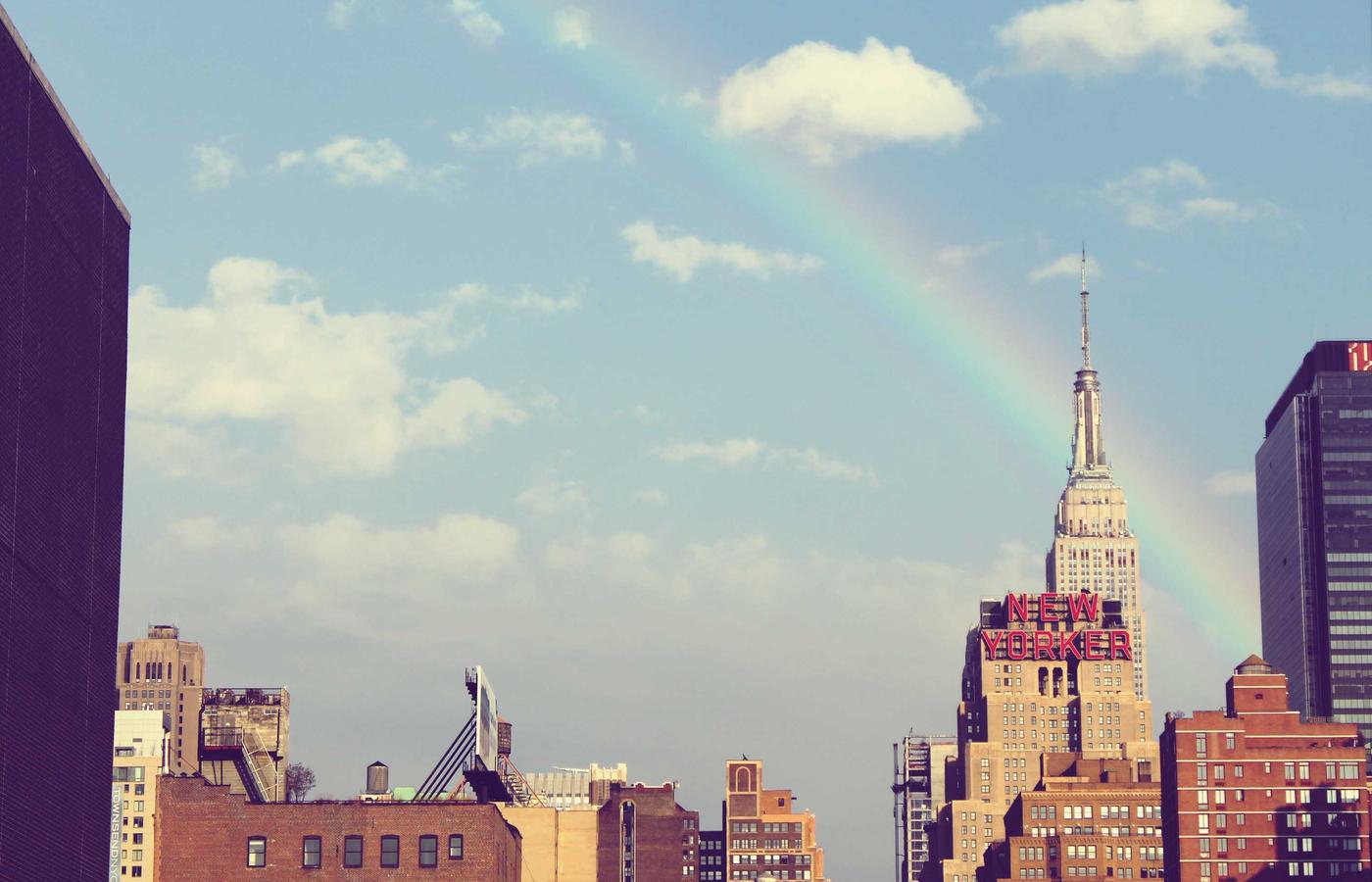 A group of diverse people smiling and working together